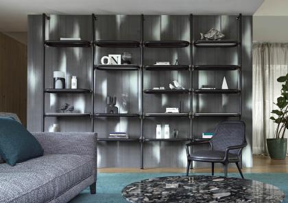 Designer bookcase Ian with the Patti armchair - BertO