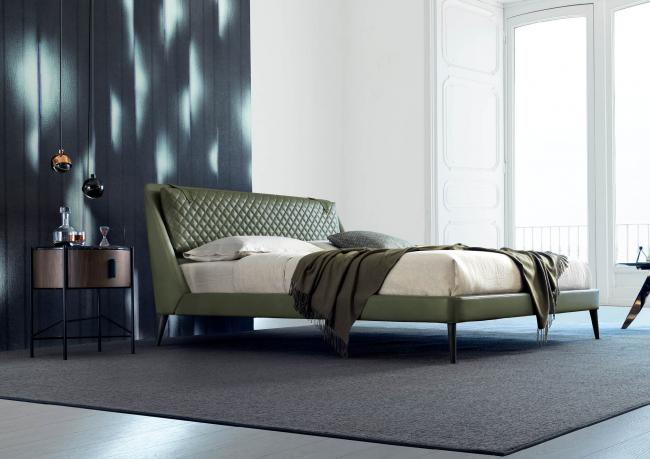 Bedroom furnished with the modern double bed model Chelsea in green leather - BertO