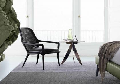 Room furnished with black Patti design armchair - BertO