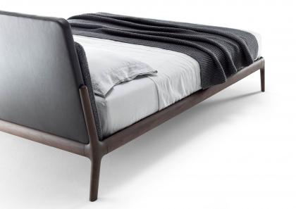 Bowery bed with leather padded headboard and fabric cushion seen from the back	 - BertO