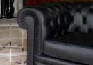 Chester sofa covered with leather and manufactured with traditional capitonné work