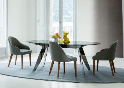 Ring table with lacquered glass top and black chromed steel base