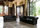 Chesterfield sofas covered in black leather - BertO Outlet