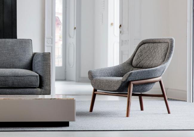 Modern fabric armchair with enveloping backrest Hanna outlet - BertO Shop