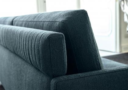 Detail of the narrow armrest of the Dee Dee sofa suitable for a modern living room
