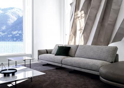 The Dee Dee corner sofa completes the furnishing scheme with the small, square Riff coffee tables in Carrara marble  - B