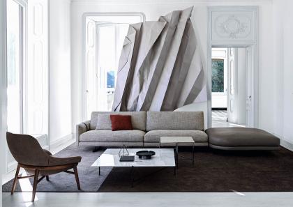 The Dee Dee corner sofa with leather pouf is matched with the Hanna armchair and the square Riff coffee tables  - BertO