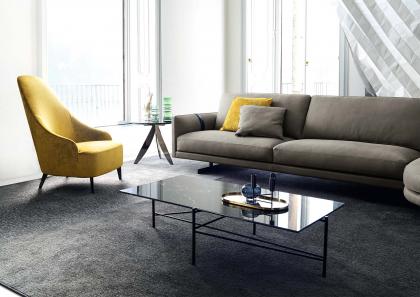 The Vanessa armchair and the Riff coffee table with marble top matched with the Dee Dee sofa with rounded peninsula. - B