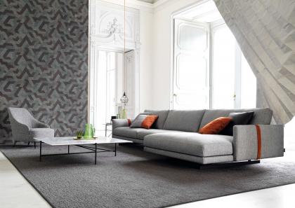 Living room furnishing scheme with Dee Dee sofa in fabric with peninsula, lacquered coffee table model Riff and Emilia